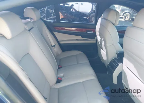 2011 BMW 750I z USA, uszkodzony, nr VIN WBAKA8C54BC446890